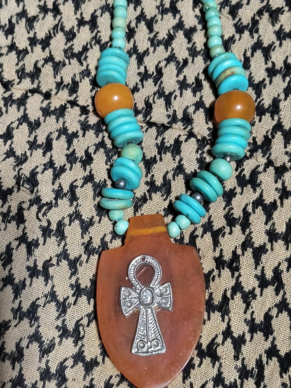 Egyptian-inspired mala necklace featuring turquoise howlite beads,